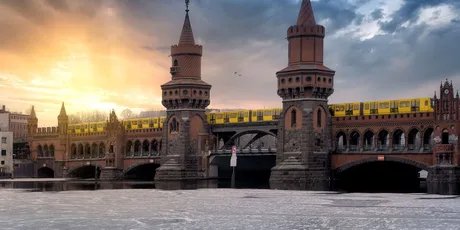 Iconic Oberbaum Bridge in Berlin, Germany, crossing the frozen Spree River