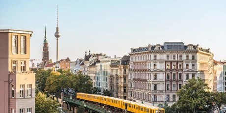 Elevated railway on Schönhauser Allee, corner of Eberswalder Straße with a view of the television tower in Berlin Prenzlauer Berg
