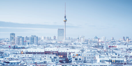 Berlin skyline with snow on the roofs