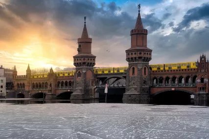 Iconic Oberbaum Bridge in Berlin, Germany, crossing the frozen Spree River