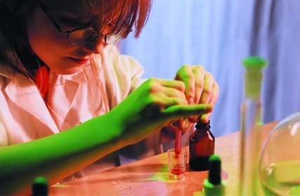 A child experiments in the laboratory