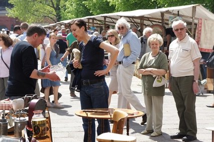 Antique market at Ostbahnhof in Berlin People at antique market Ostbahnhof in Berlin