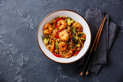 Udon stir-fry noodles with shrimp in bowl