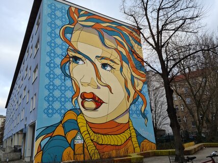 Streetart à Berlin : peinture murale d'El Bocho "Les yeux dans la grande ville