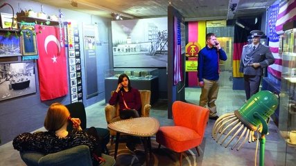 flag room at Berlin Story Museum visitors at Berlin Story Museum