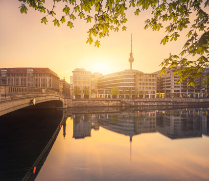 Berlin City Summer Skyline with Spree River Reflection and Sunlight