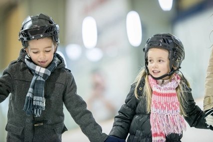Brother and Sister Skating Together