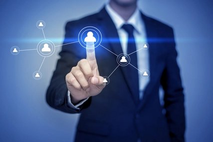 Businessman in suit working with digital virtual screen