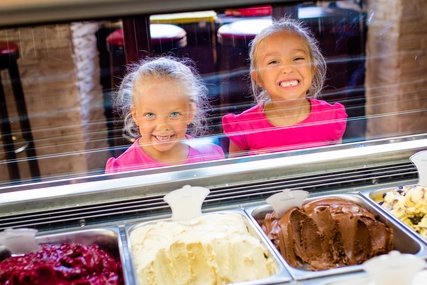 Two Funny Girls Looking At Camera