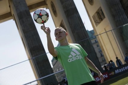 Brandenburger Tor Berlin with soccer player