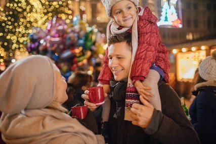 Family visiting a Christmas market Family visiting a Berlin Christmas market