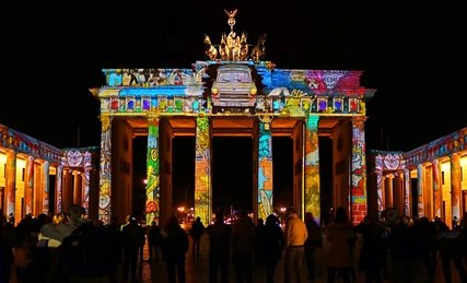 The Brandenburg Gate with colorful light installations at the Festival of Lights