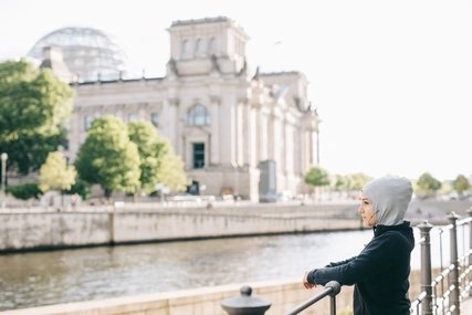 Woman taking a break from running.
