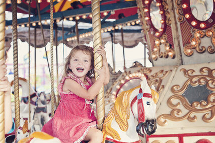 Girl on a merry-go-round
