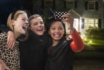 Three friends doing a Selfie on Halloween Three friends doing a Selfie on Halloween