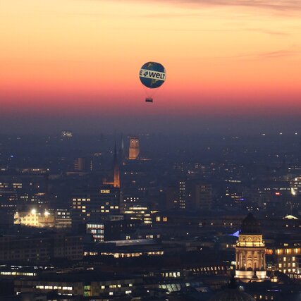 Berlin attraction world balloon with sunset