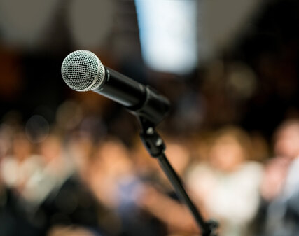 Microphone in front of an audience