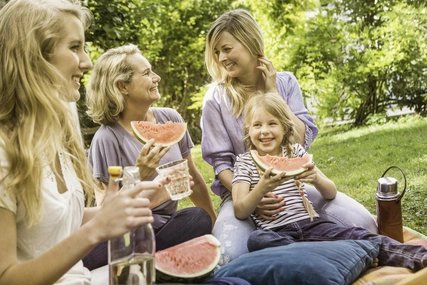 Three generation of women having picnic