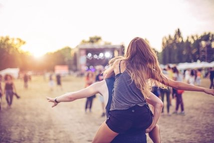 Open Air Festival Visitors celebrate at an open air festival