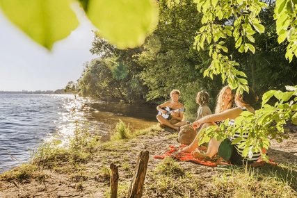 Summer mood: teenagers at the beach at Müggelsee in Berlin