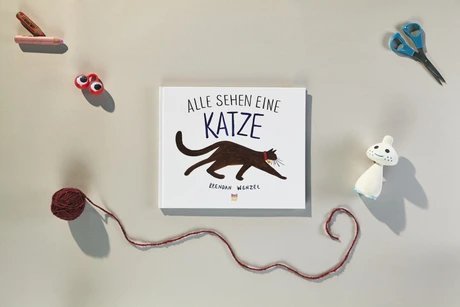 Cover zum Bilderbuch "Alle sehen eine Katze" von Brendan Wenzel