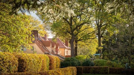 Mann mit Hut Touren - Wohnarchitektur Siemensstadt