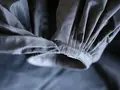 Madame Grès, Schwarzes Abendkleid mit Riesenschärpe, Detail, Acetat, Herbst/Winter 1976/77