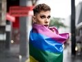 Confident Gay Boy Holding Rainbow Flag