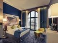Privlegezimmer mit einem Queensizebett