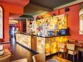 Amrit Restaurant Kreuzberg – Bartheke mit Buddha-Dekor