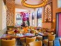 Amrit Restaurant Schöneberg – Innenansicht mit Wandkunst