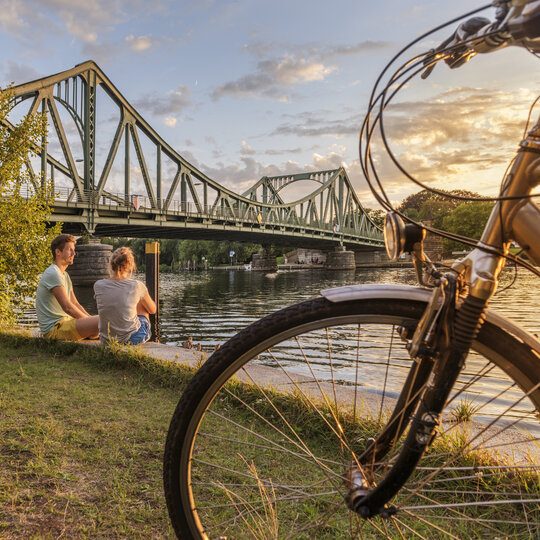 Riding by bike at Glienicker Brücke