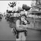 Tiny at the amusement park with "Horsey,“ Seattle, 1983