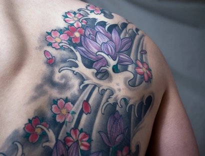 Lotus Blume Tattoo