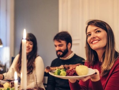 Group of friends eating a goose 