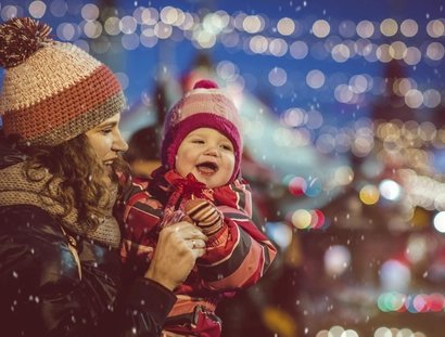 Mother and baby at the Christmas market