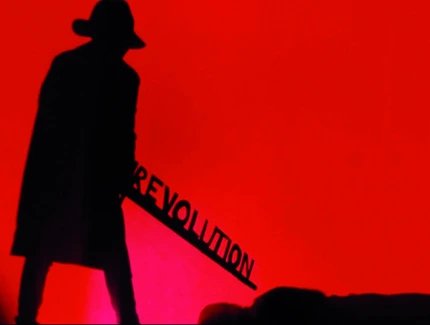 Visual zur Ausstellung "Auf die Barrikaden!" Zu sehen ist die Silhouette eines Menschen vor rotem Hintergrund sowie der Schriftzug "Revolution"
