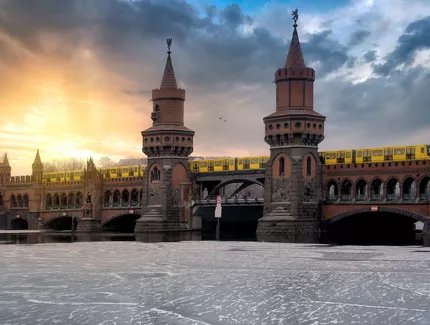 Iconic Oberbaum Bridge in Berlin, Germany, crossing the frozen Spree River