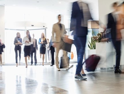 Business people walking at convention center