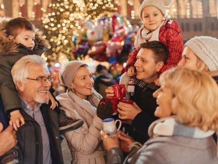 Happy family at the Christmas market