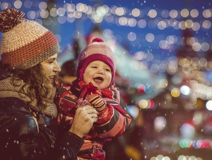 Mother and baby at the Christmas market