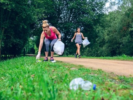 Two girls doing plogging