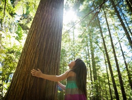 Young girl connecting with nature