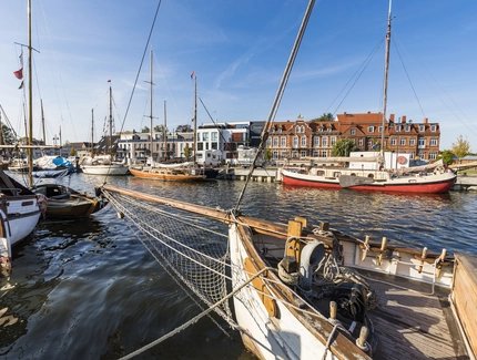 Germany, Mecklenburg-Western Pomerania, Greifswald, Sailing ships moored in harbor