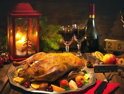Christmas table set with goose roast