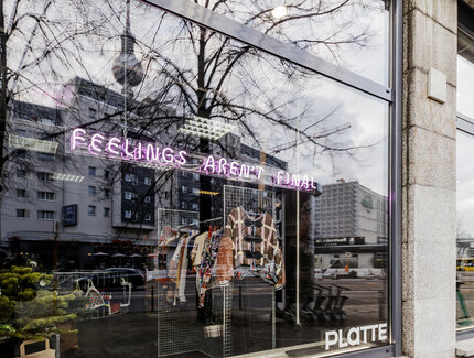Facade of Platte clothing shop - place for fashion, sustainability and trendsetting with LED lettering feelings aren't final