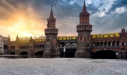 Iconic Oberbaum Bridge in Berlin, Germany, crossing the frozen Spree River