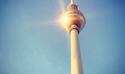 The Berlin TV Tower against a blue sky