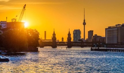 Berlin skyline with Spree river at sunset, Germany