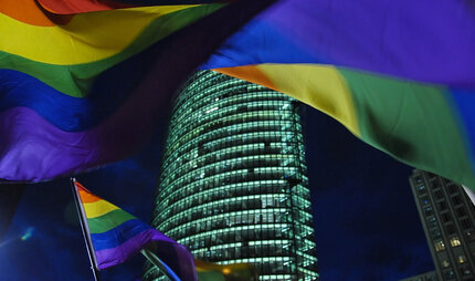 rainbow-coloured flags at Potsdamer Platz